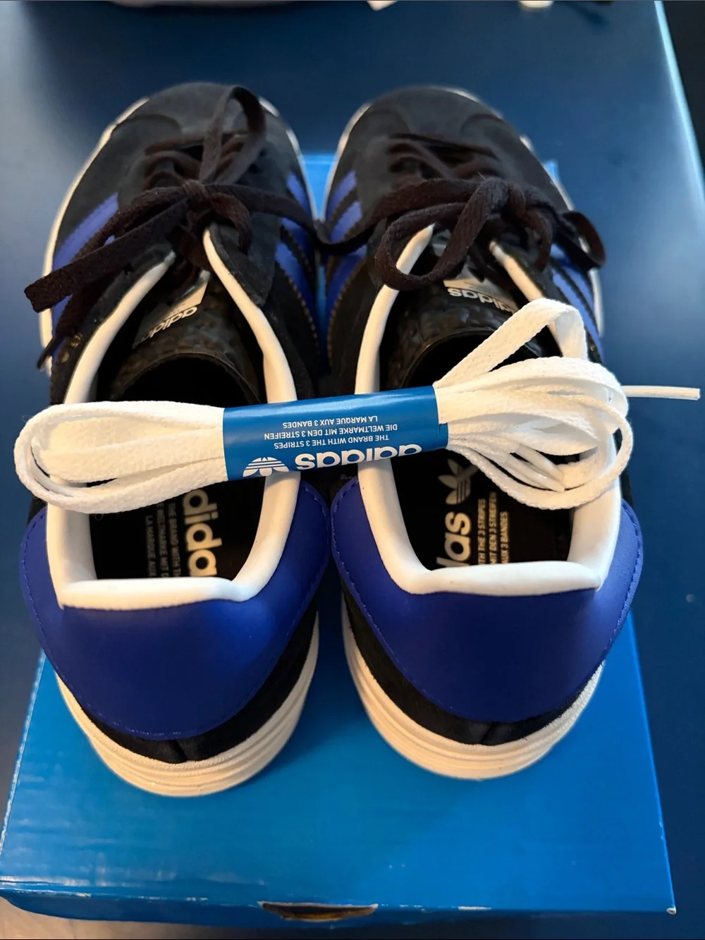 Adidas women’s Black and Blue Gazelle Suede Sneaker